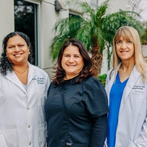 Team Photo Group shot of our three staff members outside of the office: Dr. Reddy, Soraya, and Dr. Gerson.